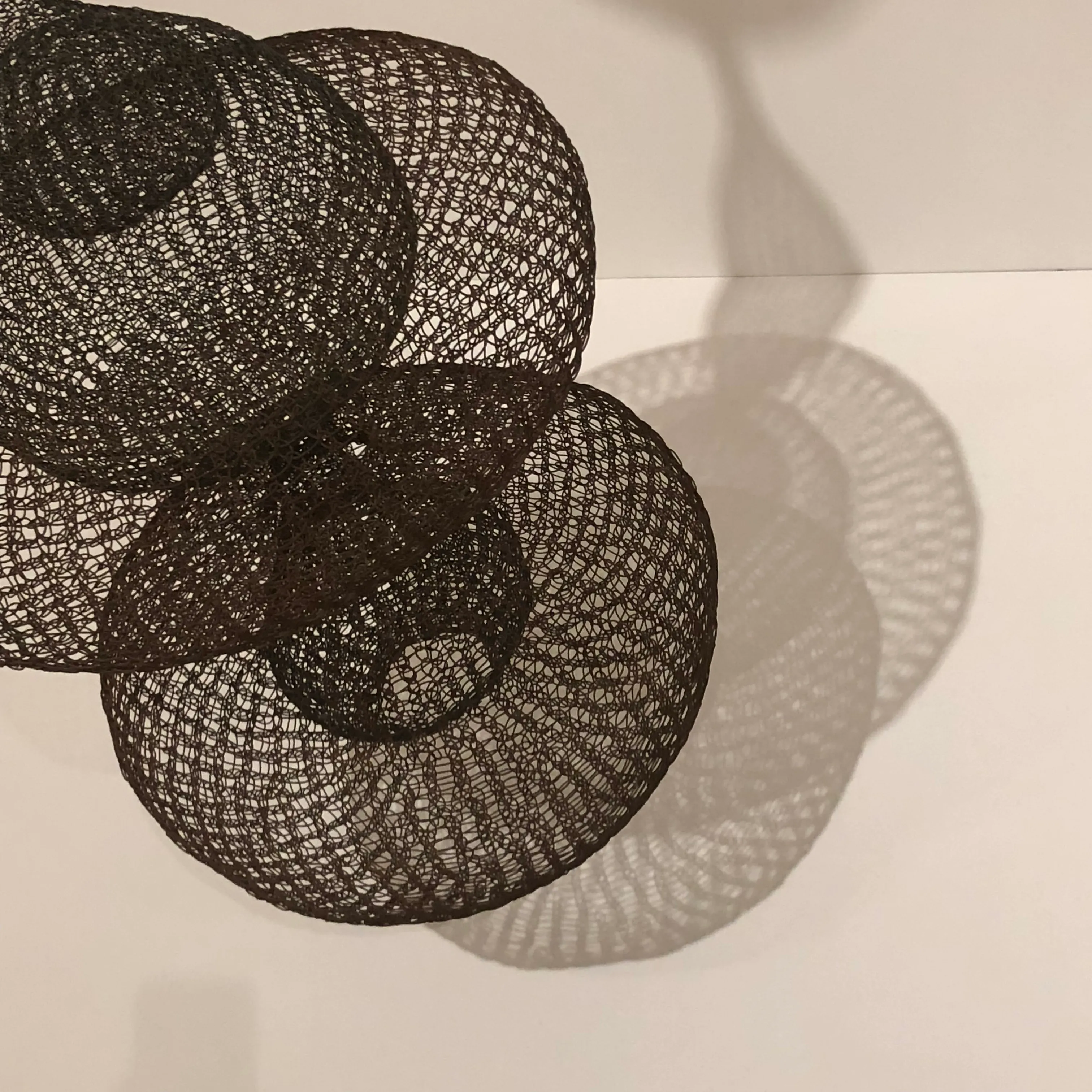 Untitled (S.114, Hanging, Six-Lobed Continuous Form within a Form with One Suspended and Two Tied Spheres)