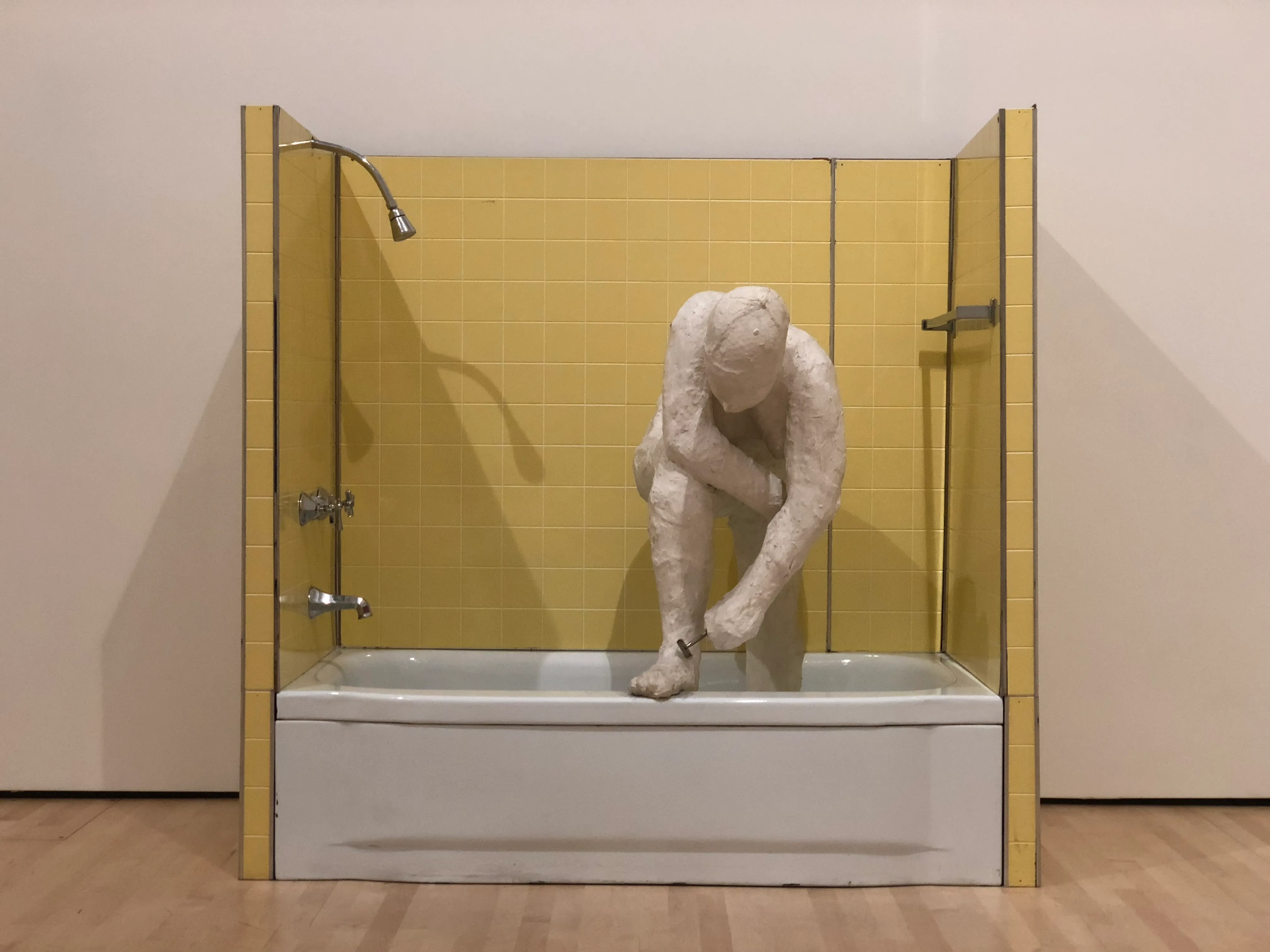 Woman Shaving Her Leg