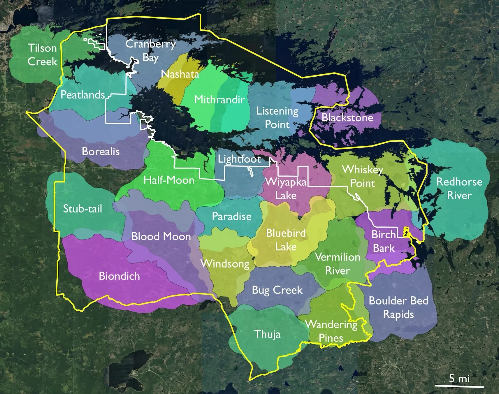 A detailed satellite map of the same geographical region, outlining and naming specific wolf pack territories. A prominent yellow border defines a large central tracking zone, and a white line zig-zags horizontally through the upper half of the map.