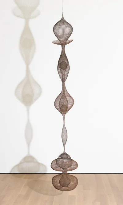 Untitled (S.114, Hanging, Six-Lobed Continuous Form within a Form with One Suspended and Two Tied Spheres) by Ruth Asawa